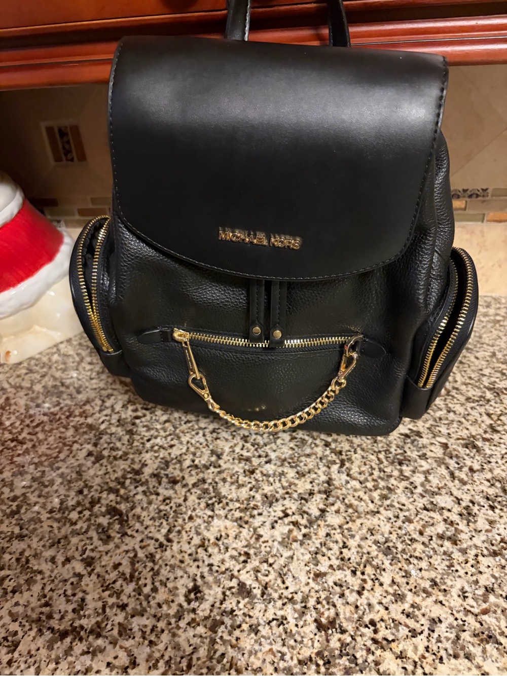 Michael Kors Black Leather Backpack with Gold Chain Accents